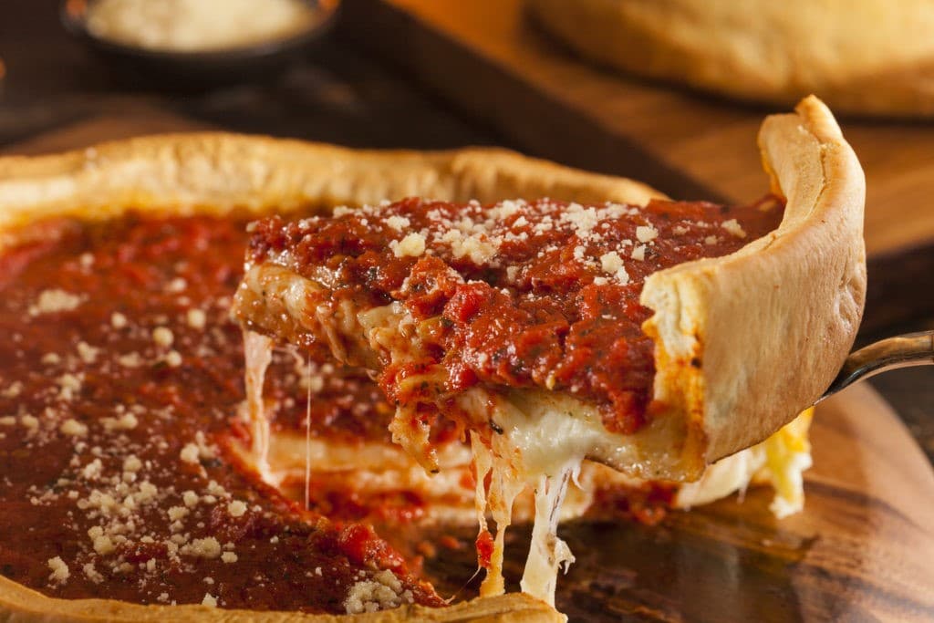 La pizza de plato profundo de Chicago | 10 alimentos garantizados para hacerte feliz | Bayas cerebrales